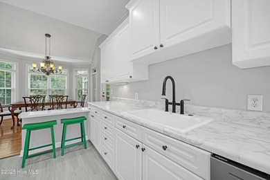 Welcome to this spacious and beautifully maintained 4-bedroom on Magnolia Greens Golf Plantation in North Carolina - for sale on GolfHomes.com, golf home, golf lot