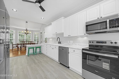 Welcome to this spacious and beautifully maintained 4-bedroom on Magnolia Greens Golf Plantation in North Carolina - for sale on GolfHomes.com, golf home, golf lot