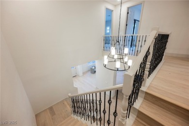 Nestled in a prestigious guard-gated community, this stunning on TPC Las Vegas in Nevada - for sale on GolfHomes.com, golf home, golf lot