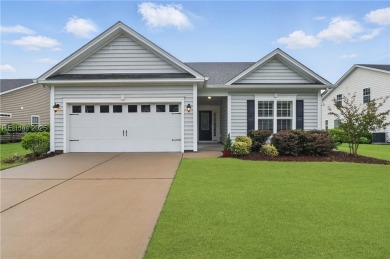 This beautifully maintained 3-bed, 2-bath home with a heated on Hilton Head Lakes Golf Club in South Carolina - for sale on GolfHomes.com, golf home, golf lot