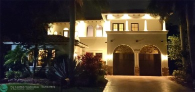 MAGNIFICENT LAKEFRONT HOME IN HIGHLY PRESTIGIOUS PARKLAND GOLF on Parkland Golf Club in Florida - for sale on GolfHomes.com, golf home, golf lot