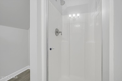 Welcome to this spacious and beautifully maintained 4-bedroom on Magnolia Greens Golf Plantation in North Carolina - for sale on GolfHomes.com, golf home, golf lot