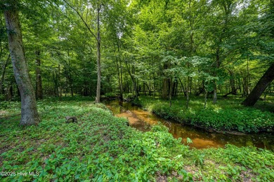 Welcome to this spacious and beautifully maintained 4-bedroom on Magnolia Greens Golf Plantation in North Carolina - for sale on GolfHomes.com, golf home, golf lot