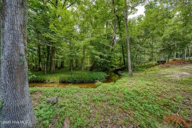 Welcome to this spacious and beautifully maintained 4-bedroom on Magnolia Greens Golf Plantation in North Carolina - for sale on GolfHomes.com, golf home, golf lot