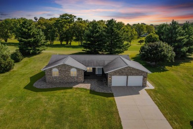 Welcome to this beautifully updated 3-bedroom, 2-bathroom home on Woods Edge Golf Course in Iowa - for sale on GolfHomes.com, golf home, golf lot