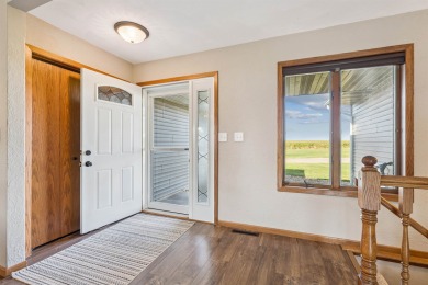 Welcome to this beautifully updated 3-bedroom, 2-bathroom home on Woods Edge Golf Course in Iowa - for sale on GolfHomes.com, golf home, golf lot