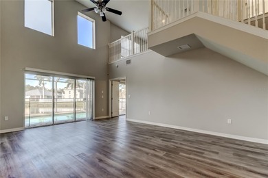 This beautifully maintained and move in ready home tucked away on Imperial Lakewoods Golf Club in Florida - for sale on GolfHomes.com, golf home, golf lot