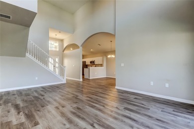 This beautifully maintained and move in ready home tucked away on Imperial Lakewoods Golf Club in Florida - for sale on GolfHomes.com, golf home, golf lot