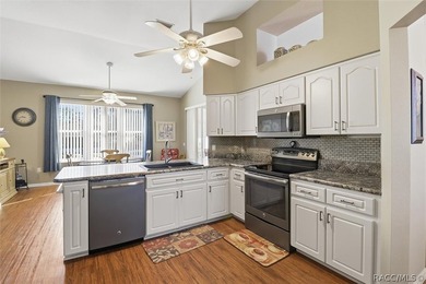 CLEAN, COMFY & NO BETTER PLACE TO HANG YOUR HAT! Among the hills on Twisted Oaks Golf Club in Florida - for sale on GolfHomes.com, golf home, golf lot