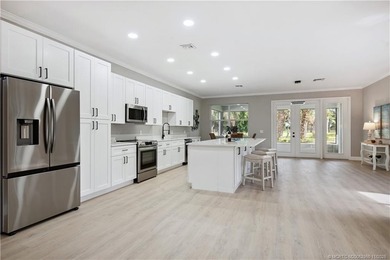 Welcome to this lovely 3 bedroom, 3 bathroom home. Nestled on a on  in Florida - for sale on GolfHomes.com, golf home, golf lot