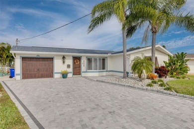 Resort-style living all year round! Waterfront home with Gulf of on Gulf Harbors Golf Course in Florida - for sale on GolfHomes.com, golf home, golf lot