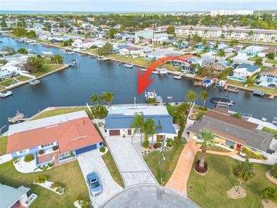 Resort-style living all year round! Waterfront home with Gulf of on Gulf Harbors Golf Course in Florida - for sale on GolfHomes.com, golf home, golf lot