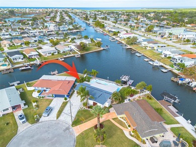 Resort-style living all year round! Waterfront home with Gulf of on Gulf Harbors Golf Course in Florida - for sale on GolfHomes.com, golf home, golf lot