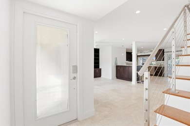 One or more photo(s) has been virtually staged. View! View! on Mangrove Bay Golf Course in Florida - for sale on GolfHomes.com, golf home, golf lot