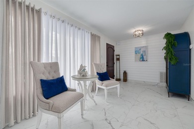 Resort-style living all year round! Waterfront home with Gulf of on Gulf Harbors Golf Course in Florida - for sale on GolfHomes.com, golf home, golf lot