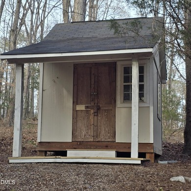 Lake life awaits in the gated community of Lake Royale! This on River Golf and Country Club at Lake Royale in North Carolina - for sale on GolfHomes.com, golf home, golf lot