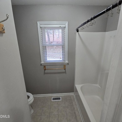 Lake life awaits in the gated community of Lake Royale! This on River Golf and Country Club at Lake Royale in North Carolina - for sale on GolfHomes.com, golf home, golf lot