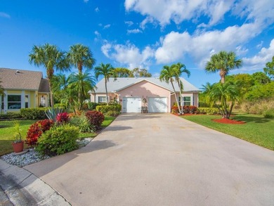 Located on the 5th tee at Gator Trace CC, this beautiful villa on Gator Trace Golf and Country Club in Florida - for sale on GolfHomes.com, golf home, golf lot