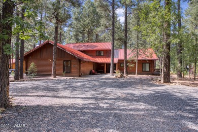 Beautifully renovated real log cabin on the fairway at Pinetop on Pinetop Lakes Country Club in Arizona - for sale on GolfHomes.com, golf home, golf lot