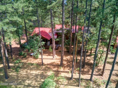 Beautifully renovated real log cabin on the fairway at Pinetop on Pinetop Lakes Country Club in Arizona - for sale on GolfHomes.com, golf home, golf lot