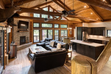 Beautifully renovated real log cabin on the fairway at Pinetop on Pinetop Lakes Country Club in Arizona - for sale on GolfHomes.com, golf home, golf lot