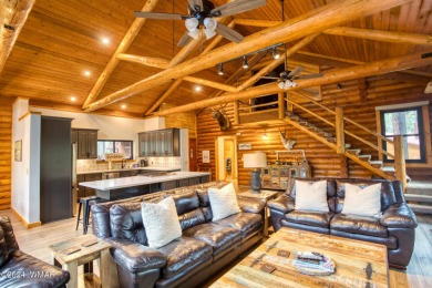 Beautifully renovated real log cabin on the fairway at Pinetop on Pinetop Lakes Country Club in Arizona - for sale on GolfHomes.com, golf home, golf lot