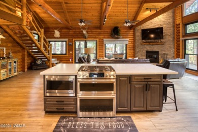 Beautifully renovated real log cabin on the fairway at Pinetop on Pinetop Lakes Country Club in Arizona - for sale on GolfHomes.com, golf home, golf lot