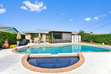 New Metal Roof! New AC! New Impact Windows! Pool! This home has on Atlantis Golf Club in Florida - for sale on GolfHomes.com, golf home, golf lot