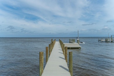 Pristinely poised on the coveted west-facing shores of Driftwood on Sandestin Golf and Beach Resort - Raven in Florida - for sale on GolfHomes.com, golf home, golf lot