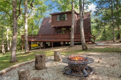 Nestled on a serene 2-acre lot at, this delightful A-frame home on Innsbrook Resort Golf Course in Missouri - for sale on GolfHomes.com, golf home, golf lot