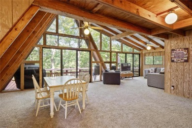 Nestled on a serene 2-acre lot at, this delightful A-frame home on Innsbrook Resort Golf Course in Missouri - for sale on GolfHomes.com, golf home, golf lot