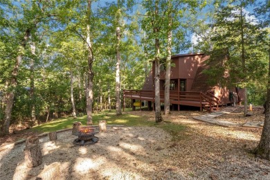 Nestled on a serene 2-acre lot at, this delightful A-frame home on Innsbrook Resort Golf Course in Missouri - for sale on GolfHomes.com, golf home, golf lot