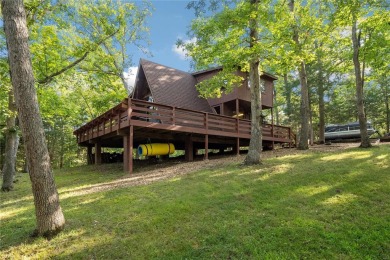 Nestled on a serene 2-acre lot at, this delightful A-frame home on Innsbrook Resort Golf Course in Missouri - for sale on GolfHomes.com, golf home, golf lot