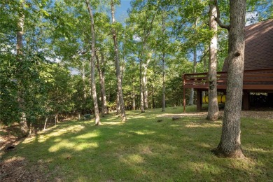 Nestled on a serene 2-acre lot at, this delightful A-frame home on Innsbrook Resort Golf Course in Missouri - for sale on GolfHomes.com, golf home, golf lot