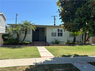 This single-story home situated in South of Conant neighborhood on Skylinks At Long Beach Golf Course in California - for sale on GolfHomes.com, golf home, golf lot