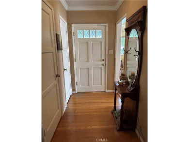This single-story home situated in South of Conant neighborhood on Skylinks At Long Beach Golf Course in California - for sale on GolfHomes.com, golf home, golf lot