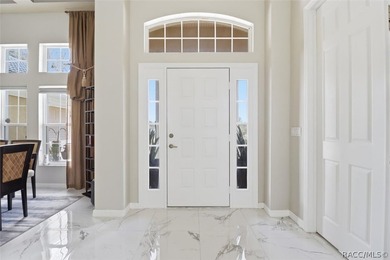 Nestled beneath a canopy of mature oaks on a lush, expansive lot on Citrus Hills Golf Club in Florida - for sale on GolfHomes.com, golf home, golf lot