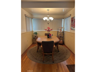 This single-story home situated in South of Conant neighborhood on Skylinks At Long Beach Golf Course in California - for sale on GolfHomes.com, golf home, golf lot