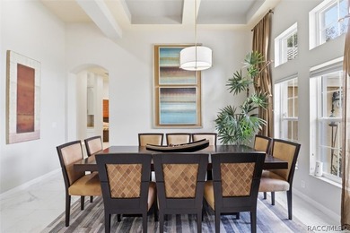 Nestled beneath a canopy of mature oaks on a lush, expansive lot on Citrus Hills Golf Club in Florida - for sale on GolfHomes.com, golf home, golf lot