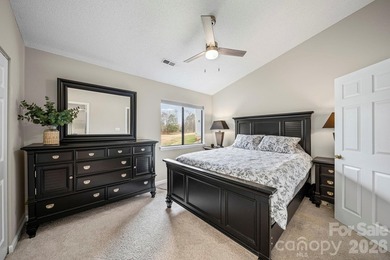 Discover low-maintenance living within the highly desirable on Raintree Country Club in North Carolina - for sale on GolfHomes.com, golf home, golf lot