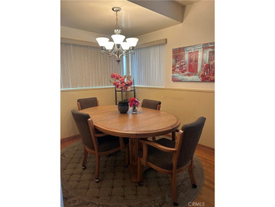 This single-story home situated in South of Conant neighborhood on Skylinks At Long Beach Golf Course in California - for sale on GolfHomes.com, golf home, golf lot
