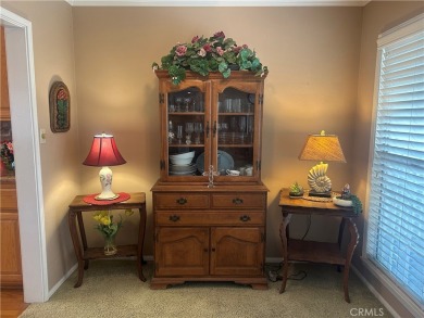 This single-story home situated in South of Conant neighborhood on Skylinks At Long Beach Golf Course in California - for sale on GolfHomes.com, golf home, golf lot