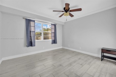 Remodeled apartment with stunning golf course and lake views! on Grande Oaks Golf Club in Florida - for sale on GolfHomes.com, golf home, golf lot