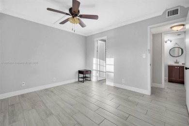Remodeled apartment with stunning golf course and lake views! on Grande Oaks Golf Club in Florida - for sale on GolfHomes.com, golf home, golf lot