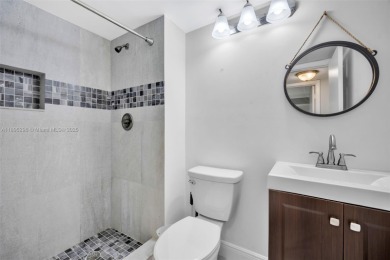 Remodeled apartment with stunning golf course and lake views! on Grande Oaks Golf Club in Florida - for sale on GolfHomes.com, golf home, golf lot