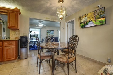 Welcome home to this well-maintained 2-bedroom, 2 bath CBS home on Leisureville Community Golf Course in Florida - for sale on GolfHomes.com, golf home, golf lot