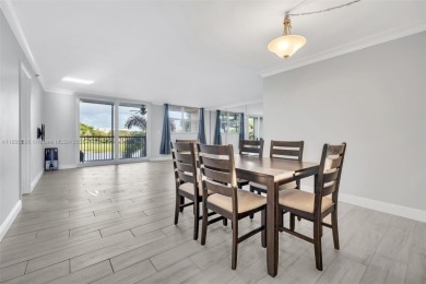 Remodeled apartment with stunning golf course and lake views! on Grande Oaks Golf Club in Florida - for sale on GolfHomes.com, golf home, golf lot