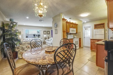 Welcome home to this well-maintained 2-bedroom, 2 bath CBS home on Leisureville Community Golf Course in Florida - for sale on GolfHomes.com, golf home, golf lot