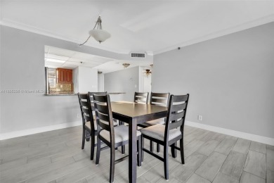 Remodeled apartment with stunning golf course and lake views! on Grande Oaks Golf Club in Florida - for sale on GolfHomes.com, golf home, golf lot