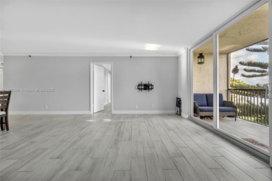 Remodeled apartment with stunning golf course and lake views! on Grande Oaks Golf Club in Florida - for sale on GolfHomes.com, golf home, golf lot